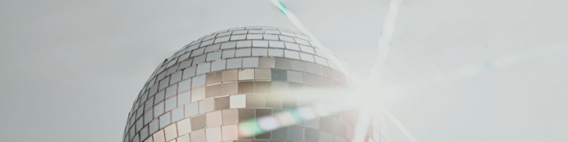 Photo by Anderson Rangel: https://www.pexels.com/photo/a-person-holding-a-disco-ball-12098769/