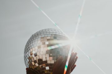 Photo by Anderson Rangel: https://www.pexels.com/photo/a-person-holding-a-disco-ball-12098769/